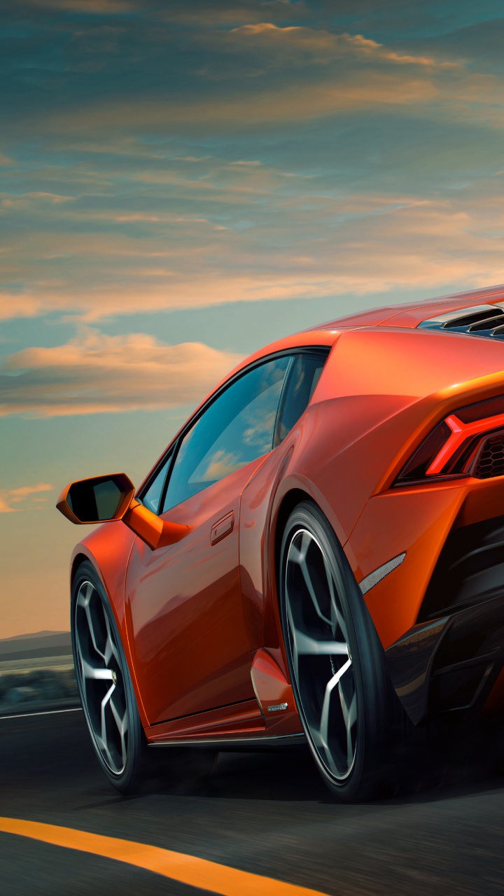 Orange Audi r 8 Tagsüber Unterwegs. Wallpaper in 720x1280 Resolution