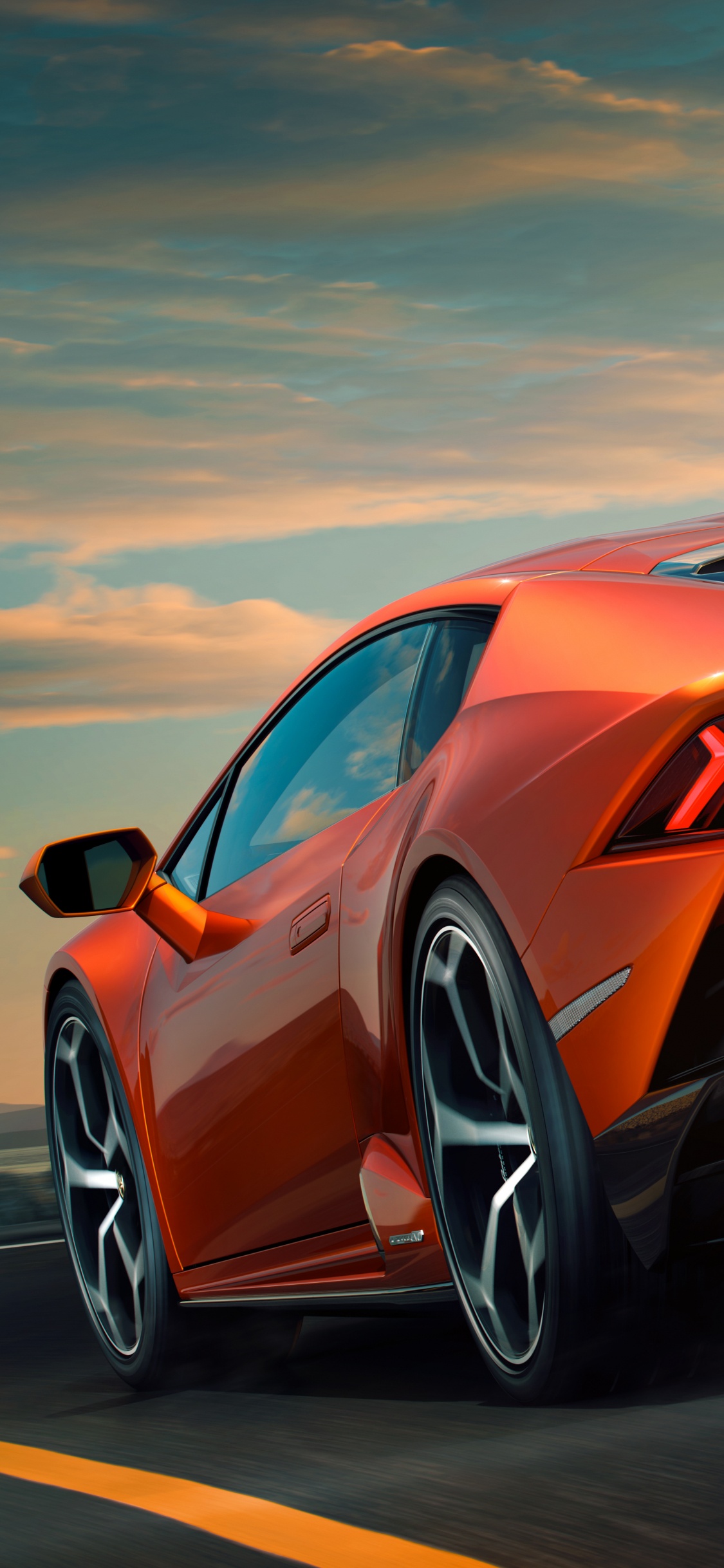 Audi Orange r 8 Sur Route Pendant la Journée. Wallpaper in 1125x2436 Resolution