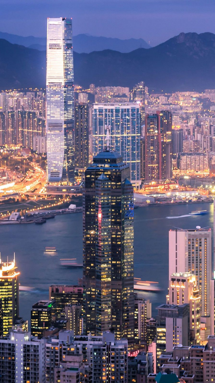 City Skyline During Night Time. Wallpaper in 750x1334 Resolution