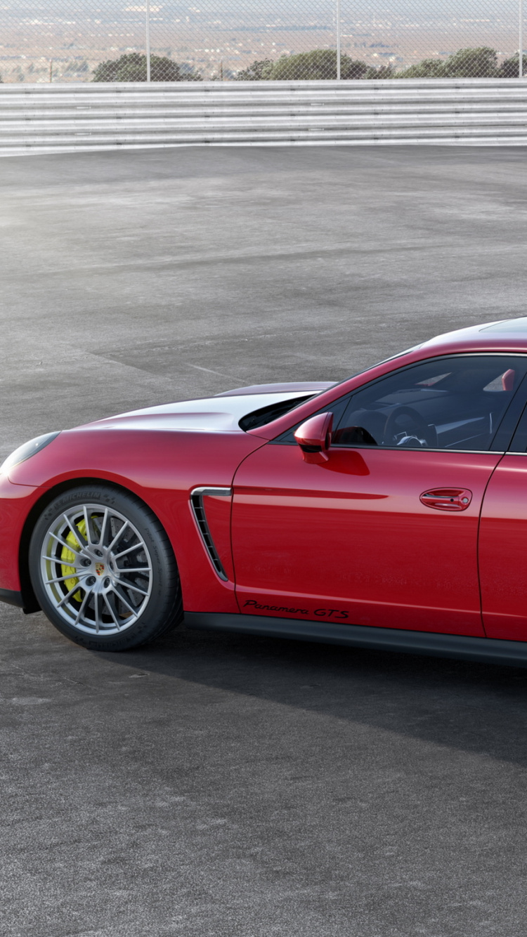Red Coupe on Gray Asphalt Road During Daytime. Wallpaper in 750x1334 Resolution