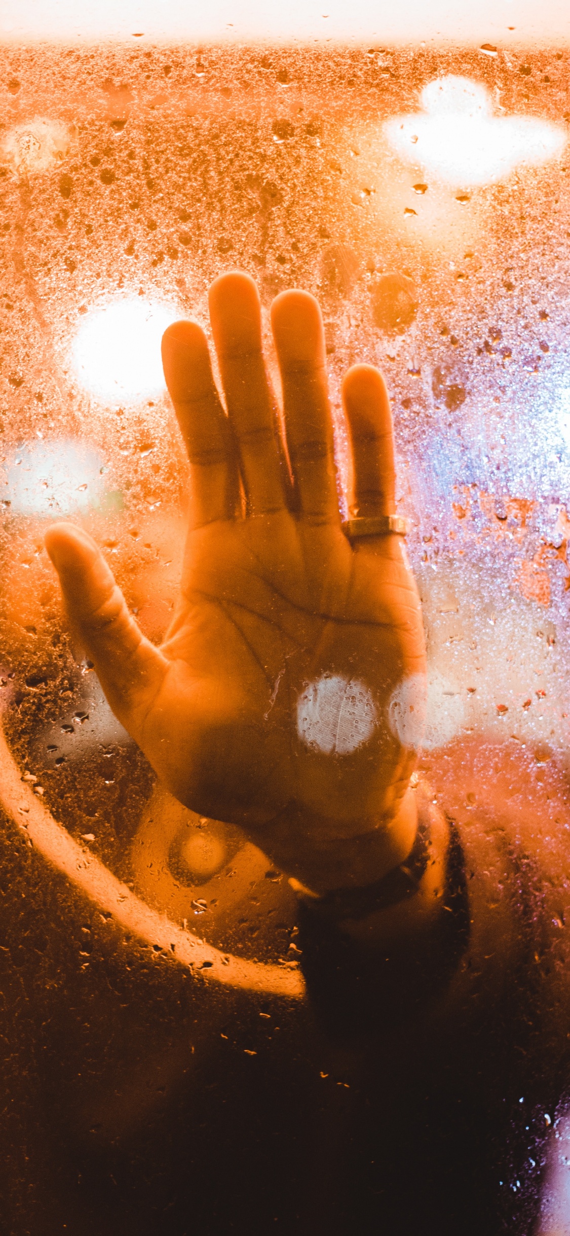 Persons Hand on Glass. Wallpaper in 1125x2436 Resolution