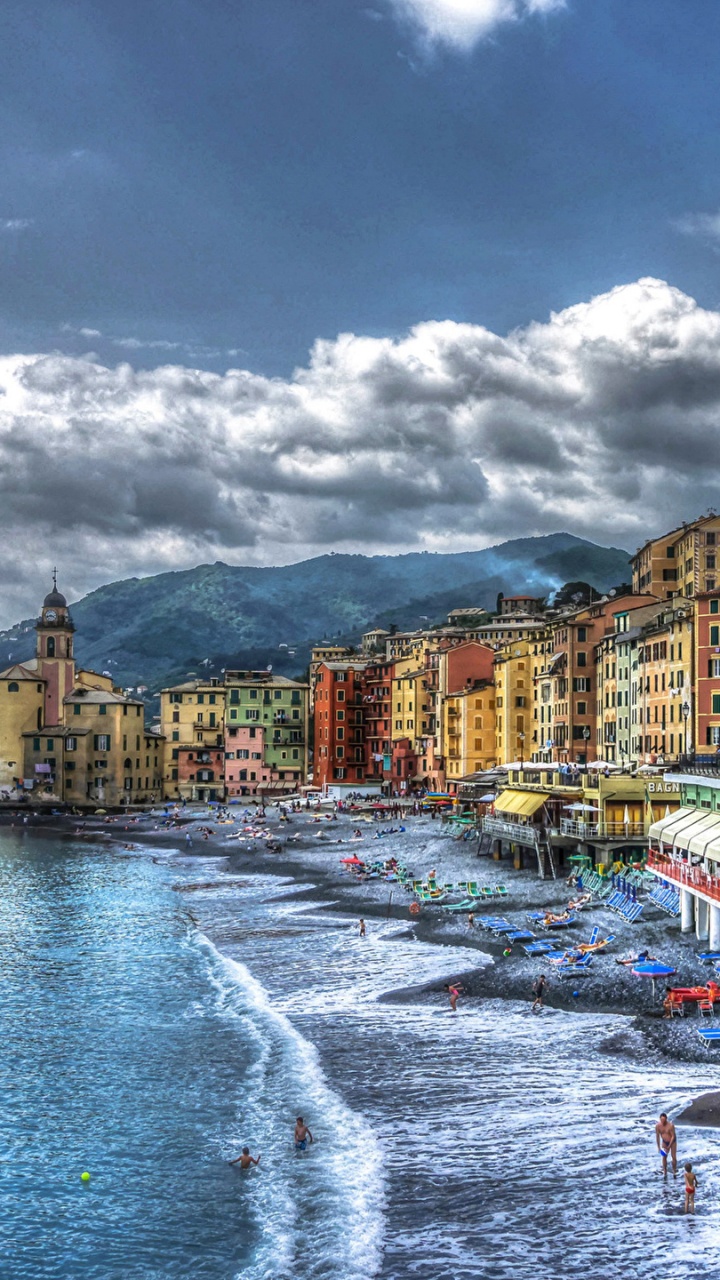 People on Beach Near Buildings Under Cloudy Sky During Daytime. Wallpaper in 720x1280 Resolution