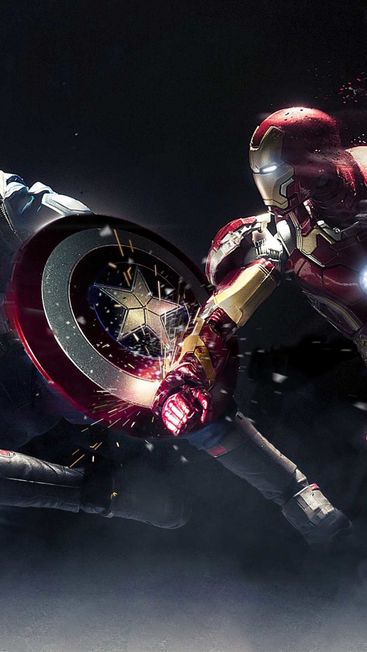 Homme en Costume Noir et Rouge Tenant un Casque Noir et Rouge. Wallpaper in 720x1280 Resolution