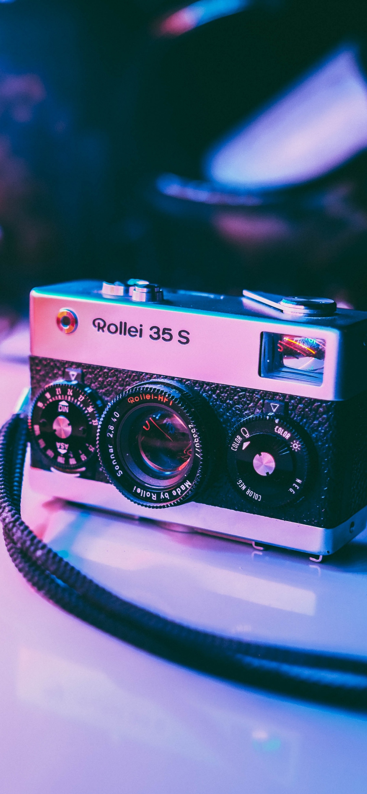 Black and Silver Camera on Table. Wallpaper in 1242x2688 Resolution