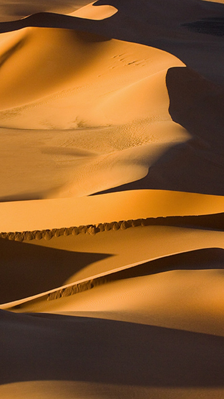 Desert Under Blue Sky During Daytime. Wallpaper in 750x1334 Resolution