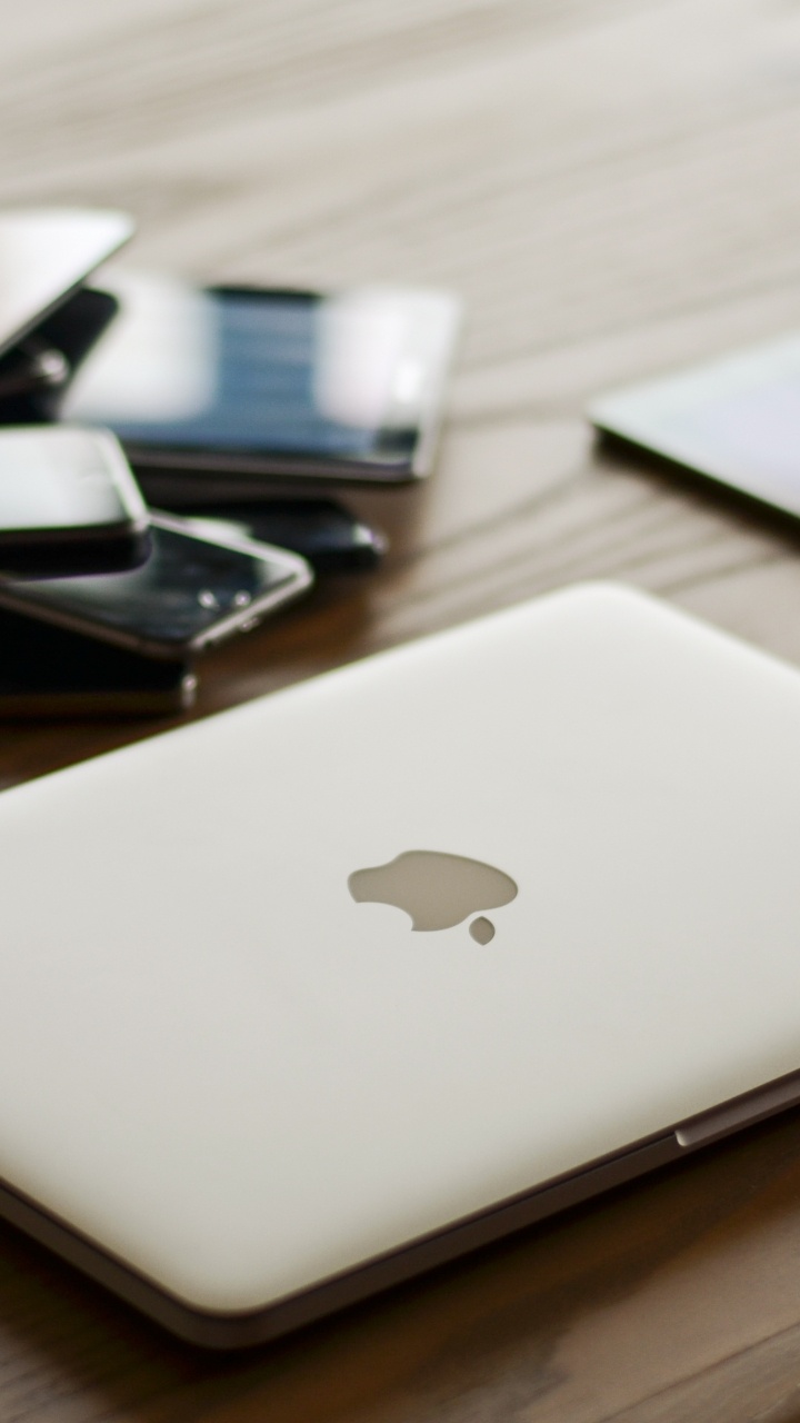 Silver Macbook on Brown Wooden Table. Wallpaper in 720x1280 Resolution