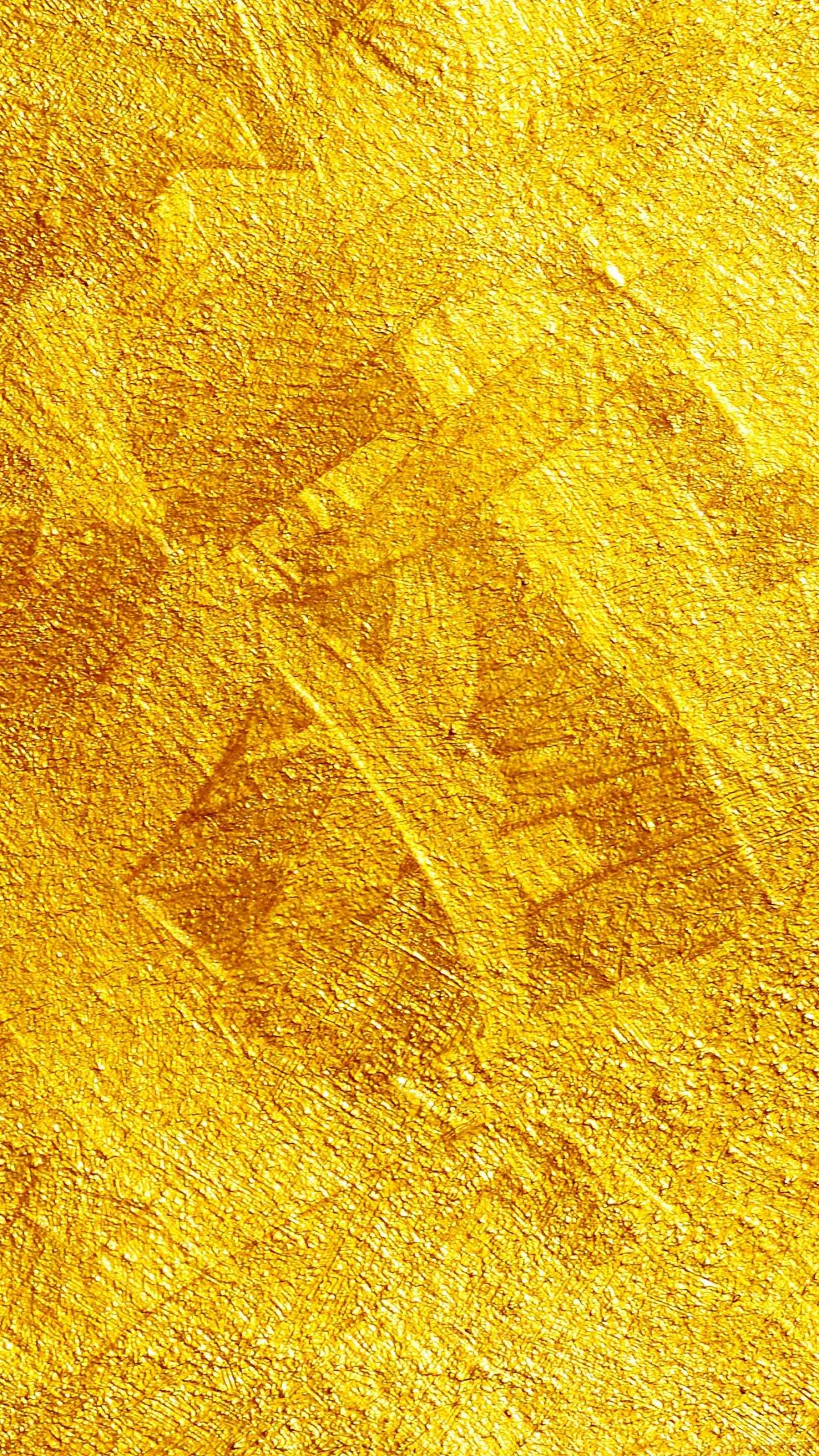 Gelber Und Brauner Teppich. Wallpaper in 1440x2560 Resolution