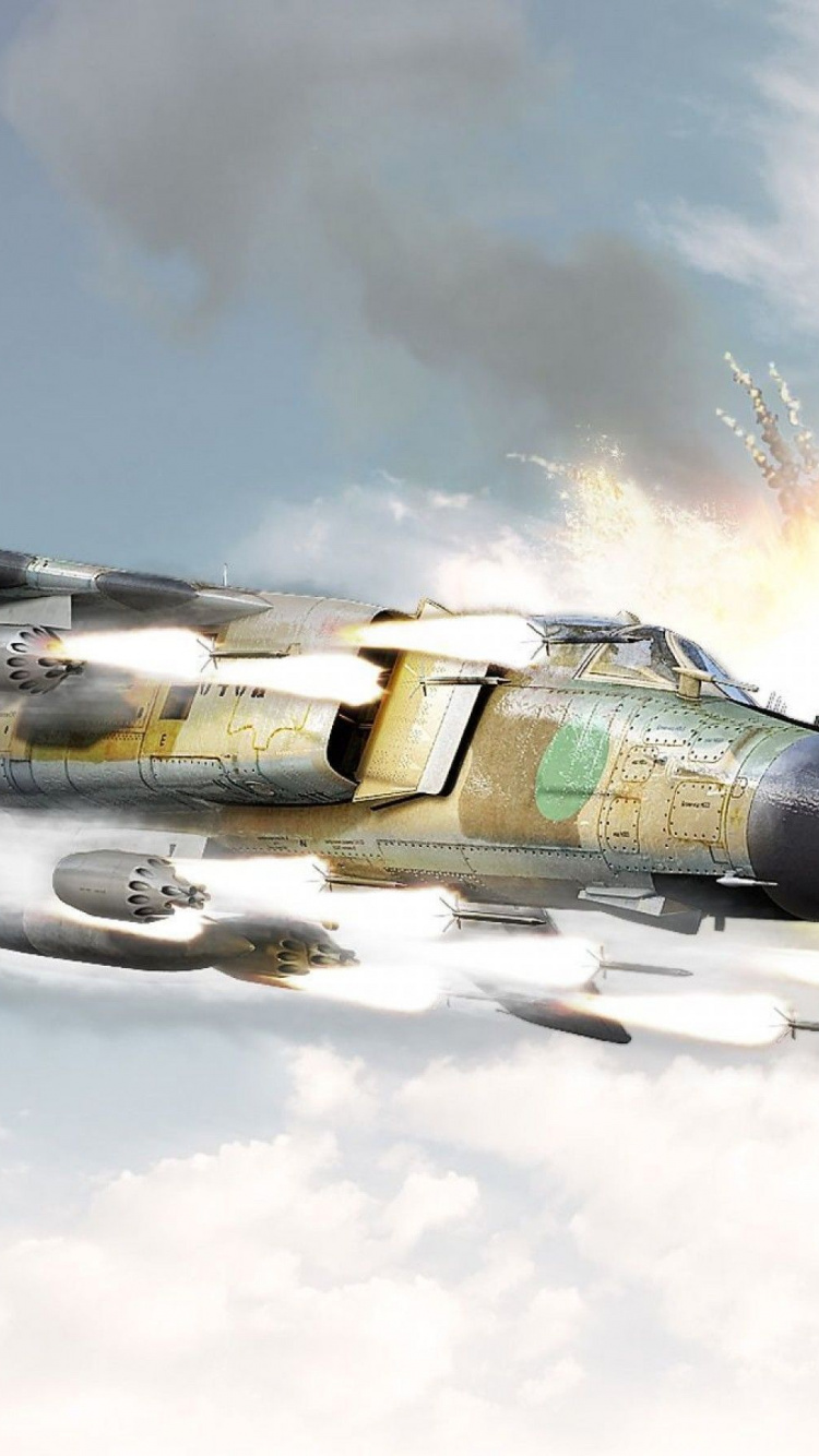 Grauer Kampfjet, Der Tagsüber am Himmel Fliegt. Wallpaper in 750x1334 Resolution