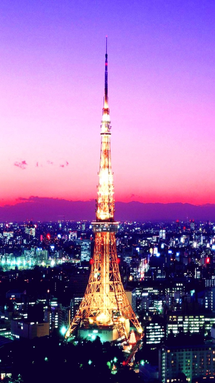 Eiffel Tower in Paris During Night Time. Wallpaper in 720x1280 Resolution