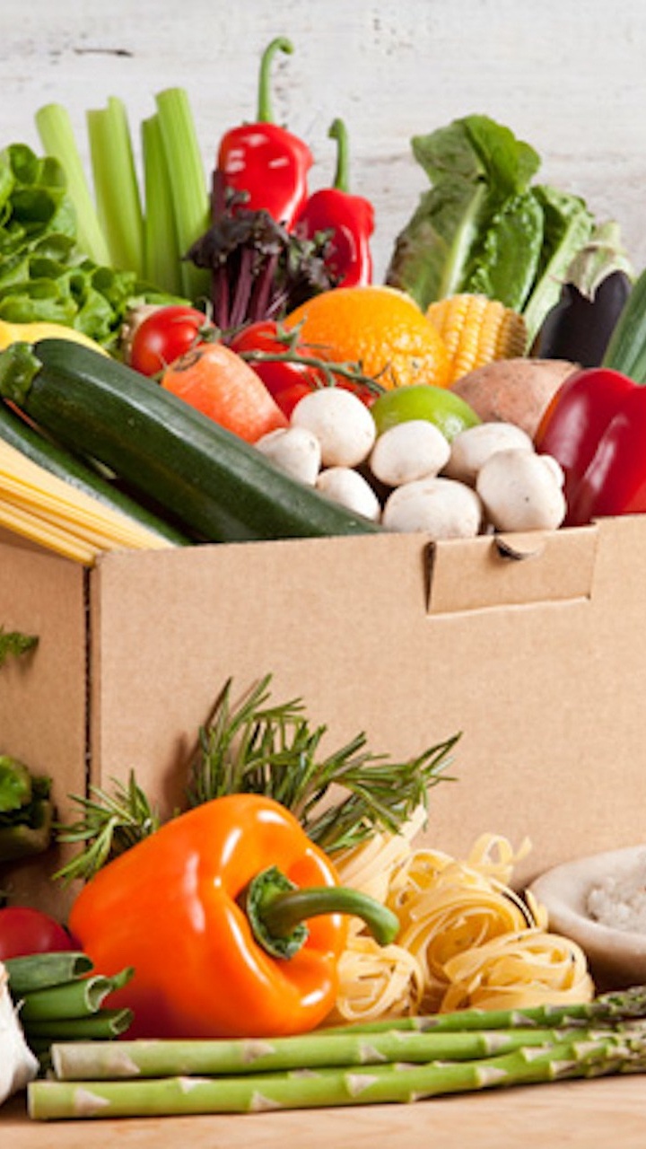 Red Tomato Beside Green Chili and Red Pepper on Brown Cardboard Box. Wallpaper in 720x1280 Resolution
