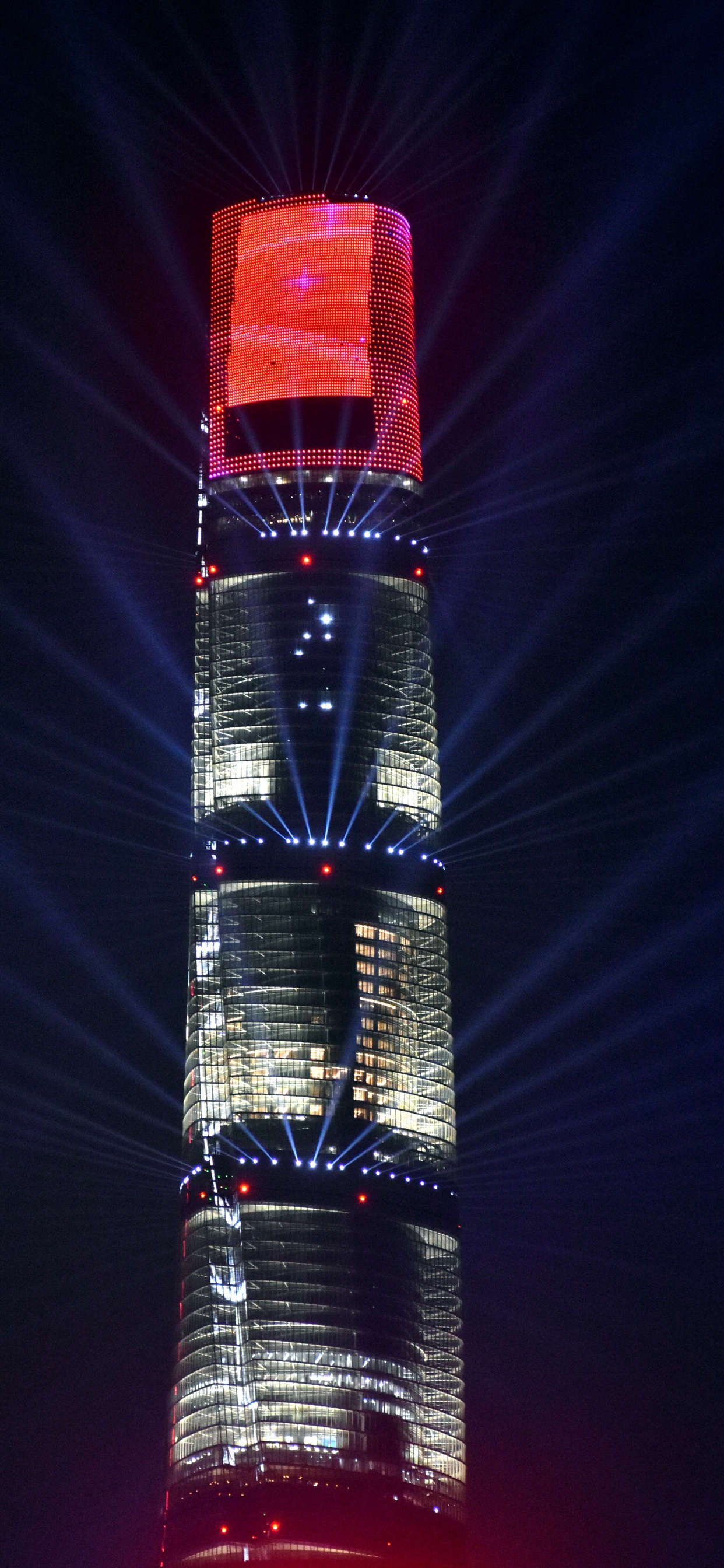 Torre Roja y Negra Durante la Noche. Wallpaper in 1242x2688 Resolution