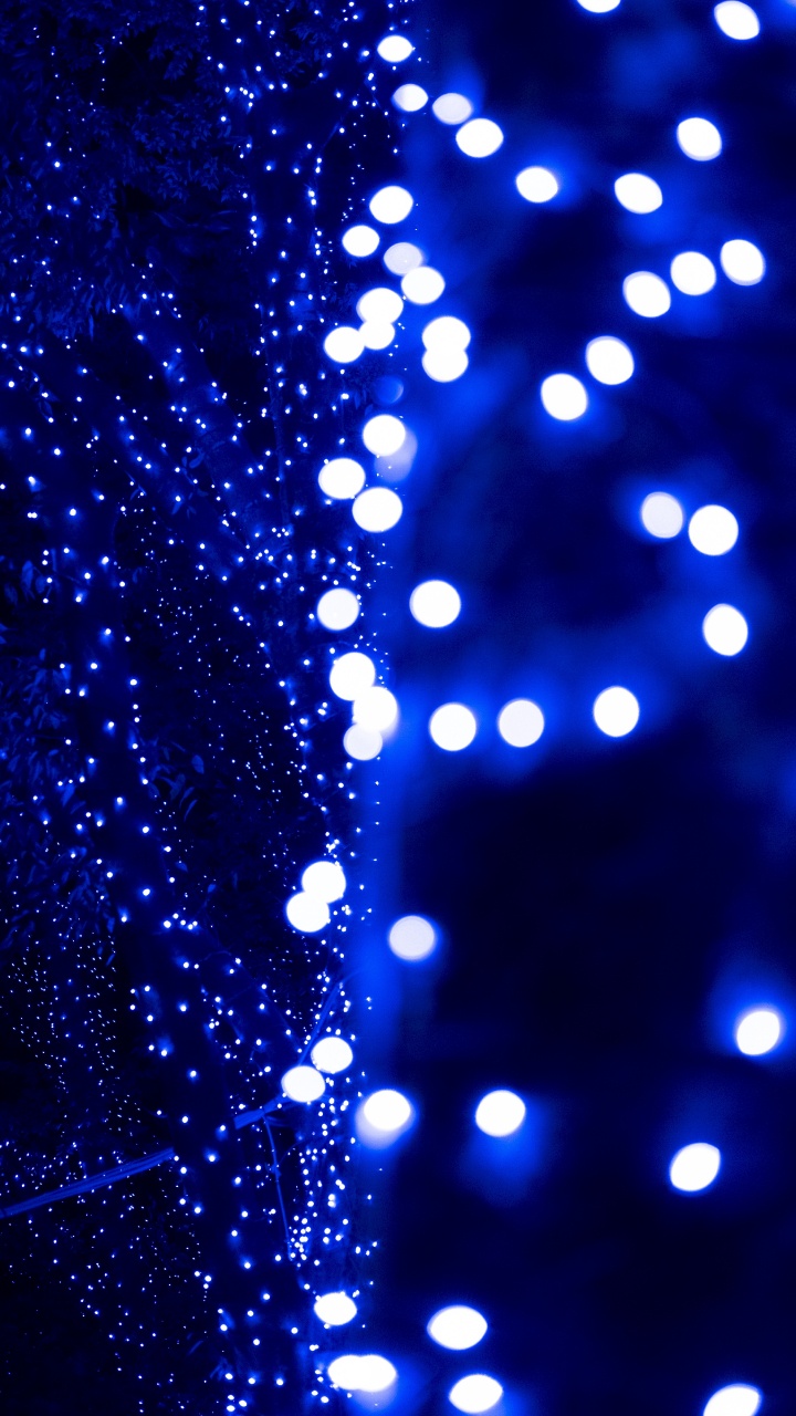 Blue and White Light Bokeh. Wallpaper in 720x1280 Resolution