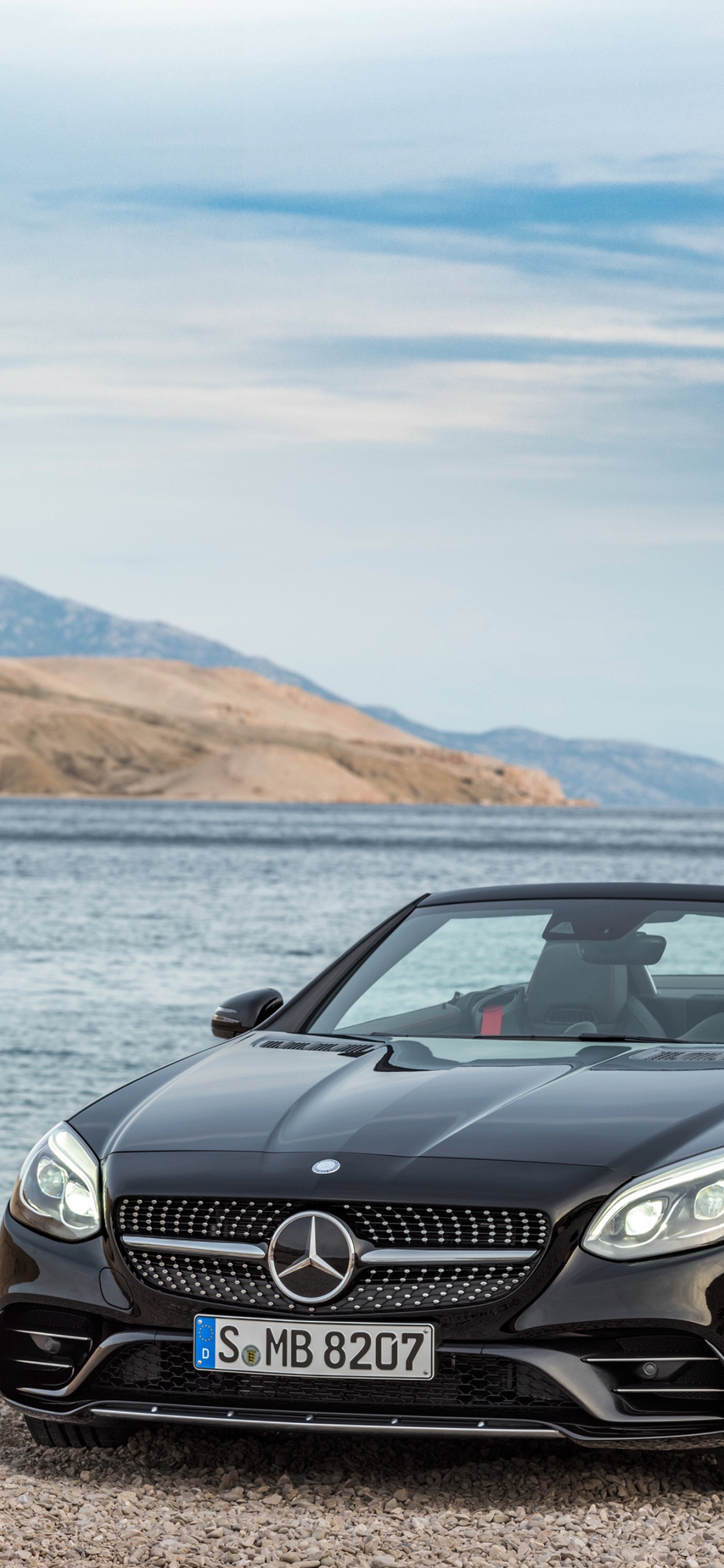 Black Bmw m 3 on Beach During Daytime. Wallpaper in 1125x2436 Resolution