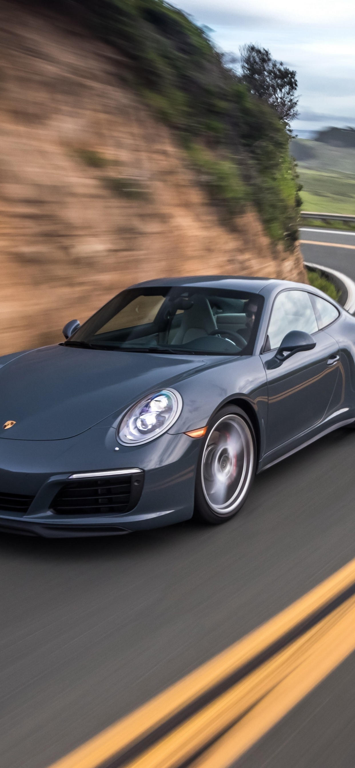 Black Porsche 911 on Road During Daytime. Wallpaper in 1242x2688 Resolution