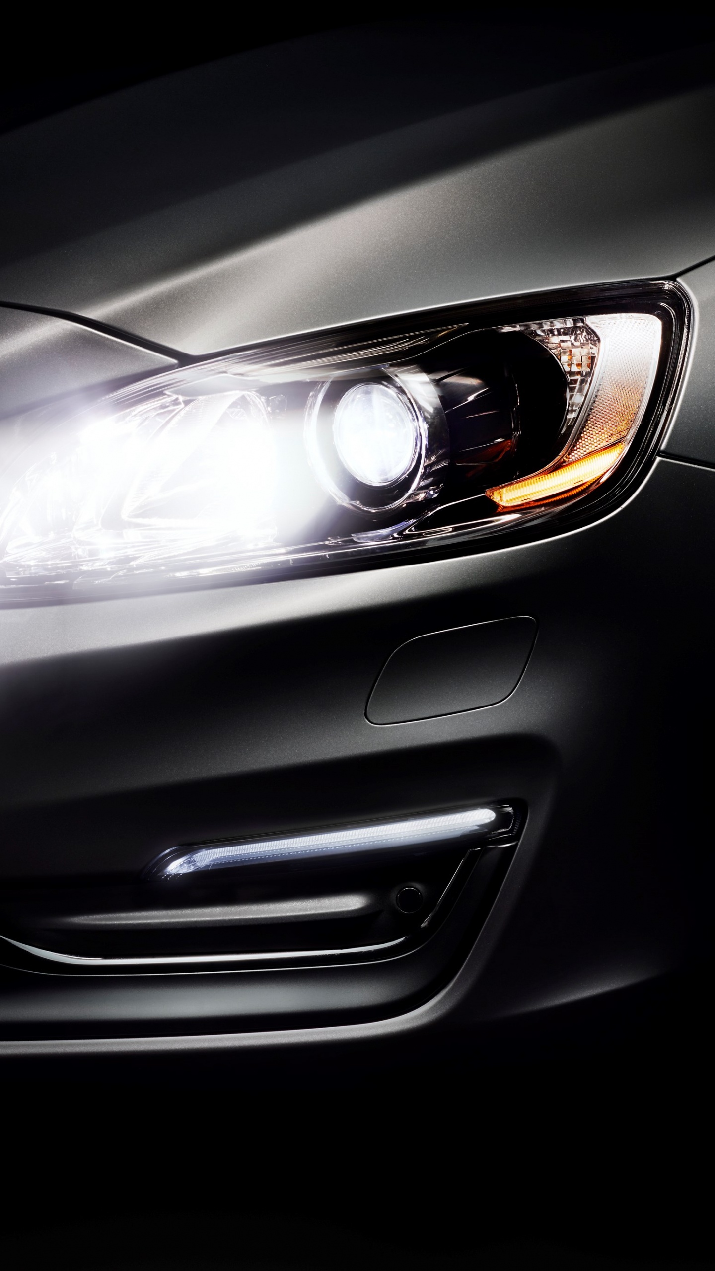 Silver Car With Black and Brown Headlight. Wallpaper in 1440x2560 Resolution