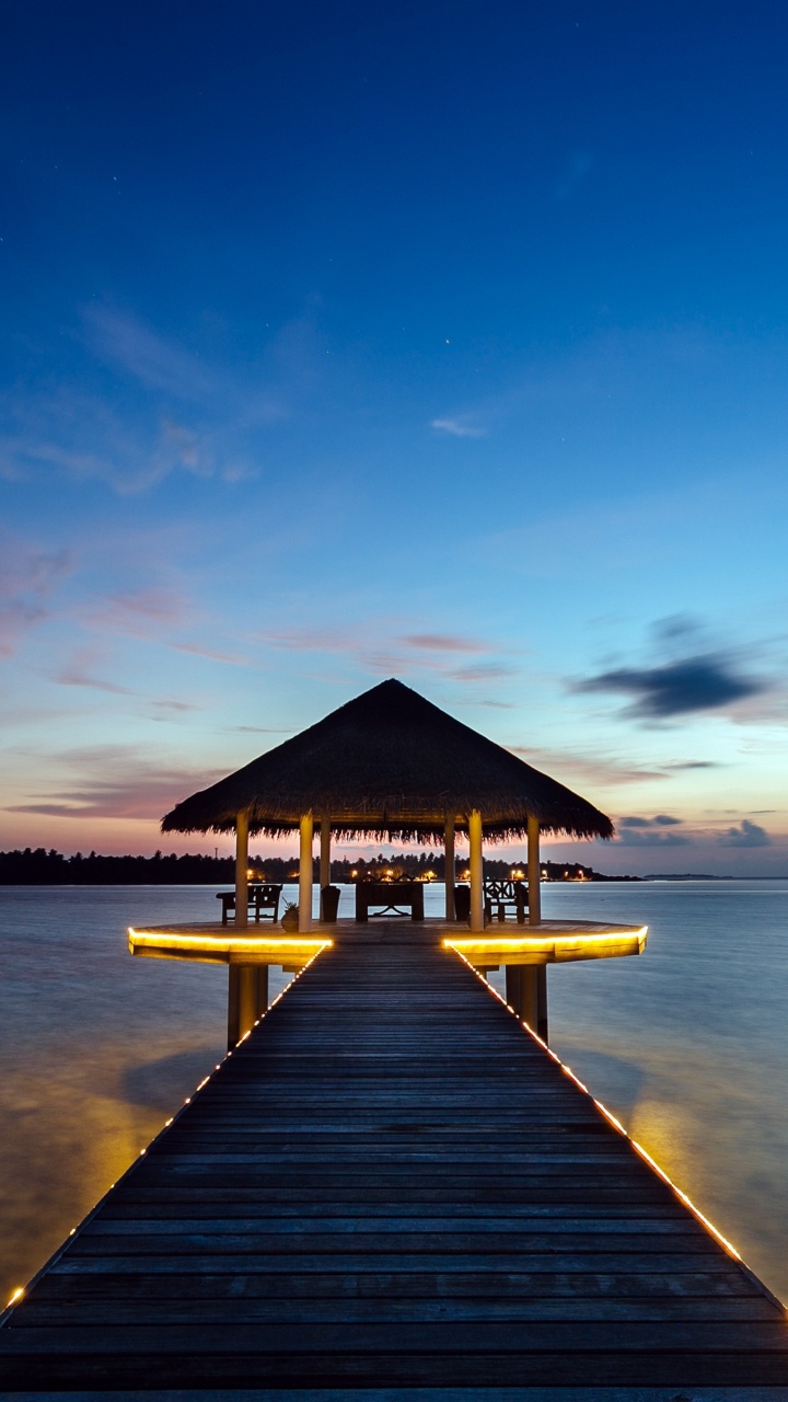 Brown Wooden Dock on Body of Water During Daytime. Wallpaper in 720x1280 Resolution