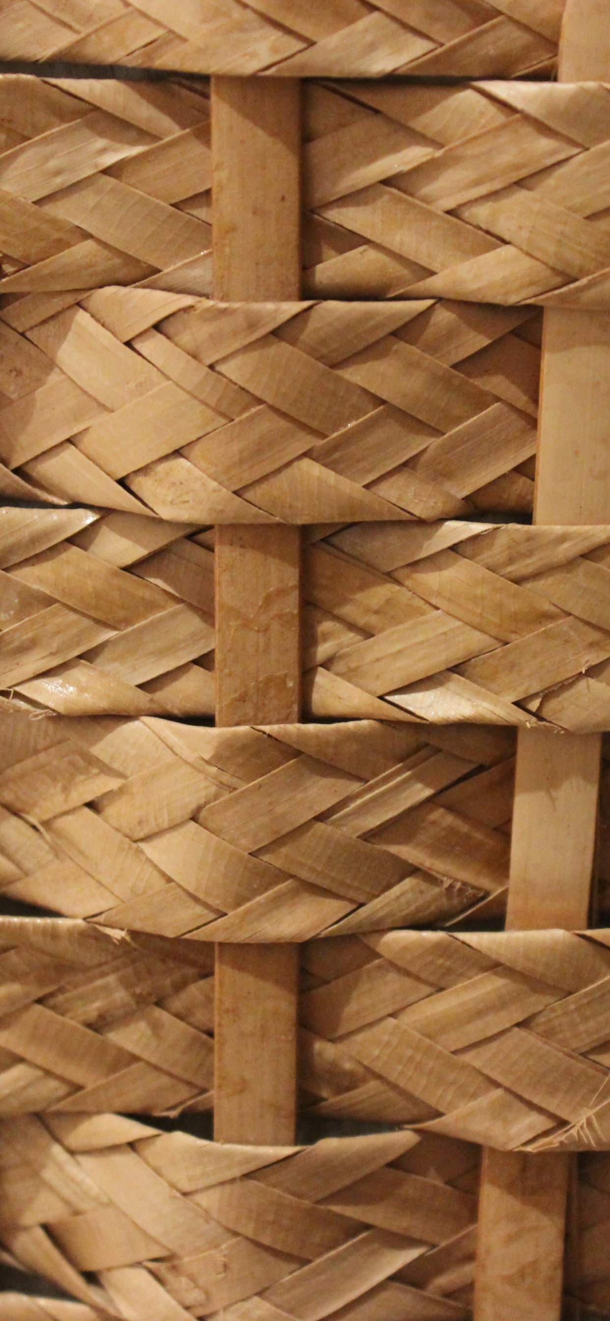Brown Woven Basket on White Textile. Wallpaper in 1242x2688 Resolution