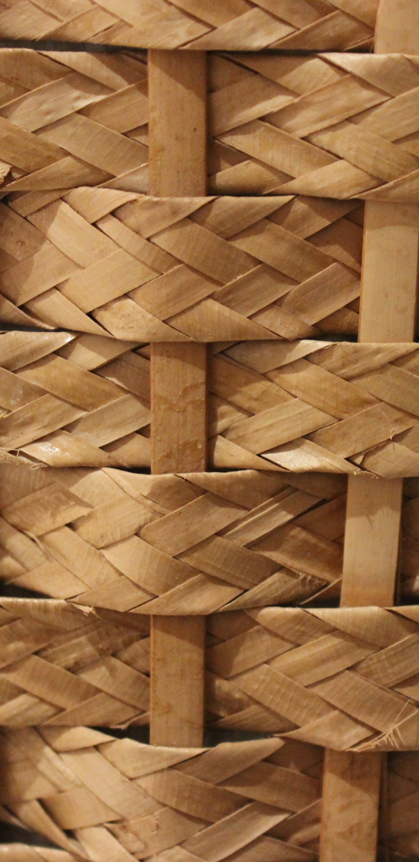 Brown Woven Basket on White Textile. Wallpaper in 1440x2960 Resolution