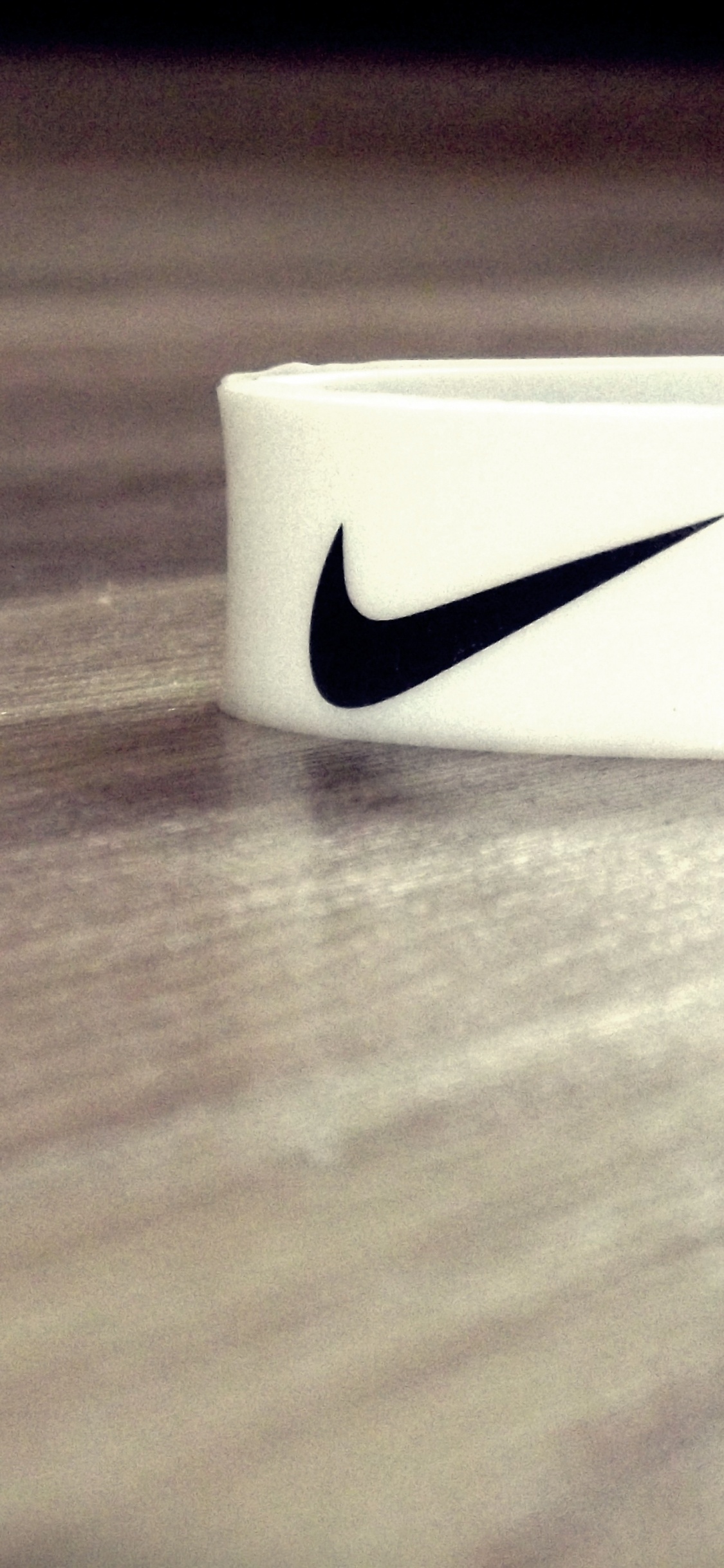 White and Black Plastic Container. Wallpaper in 1125x2436 Resolution