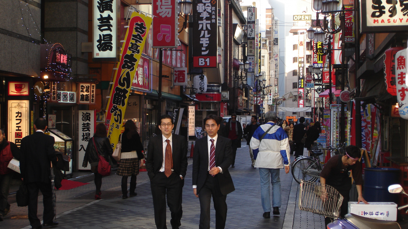 People Walking on Sidewalk During Daytime. Wallpaper in 1366x768 Resolution