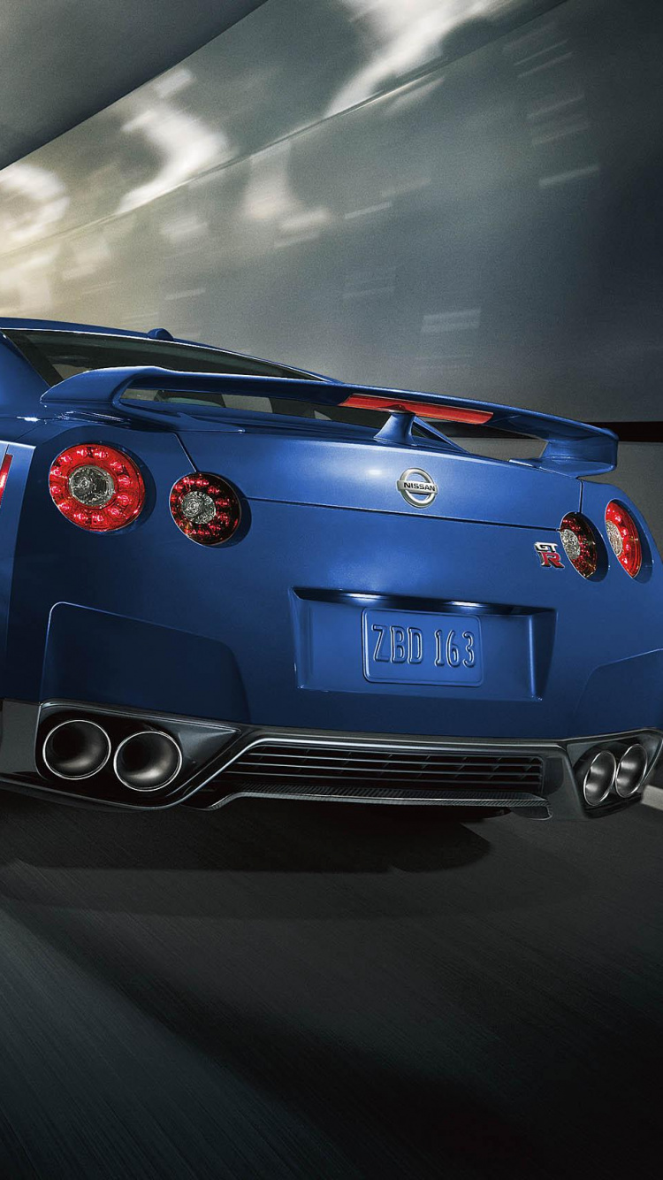 Blauer Porsche 911 Unterwegs. Wallpaper in 750x1334 Resolution