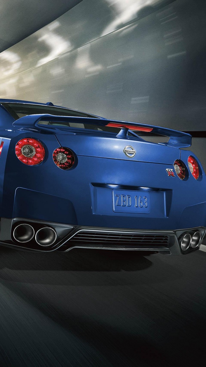 Porsche 911 Azul en la Carretera. Wallpaper in 720x1280 Resolution