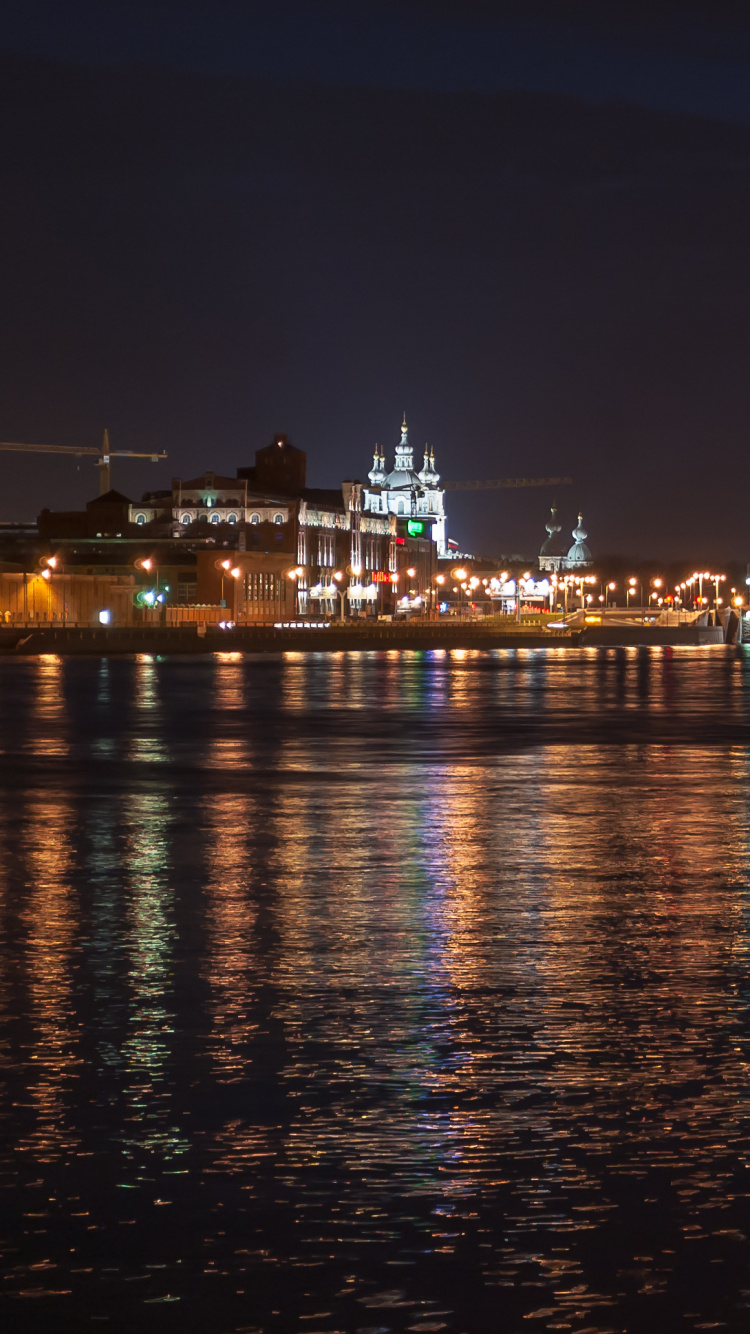 Lighted City Skyline During Night Time. Wallpaper in 750x1334 Resolution