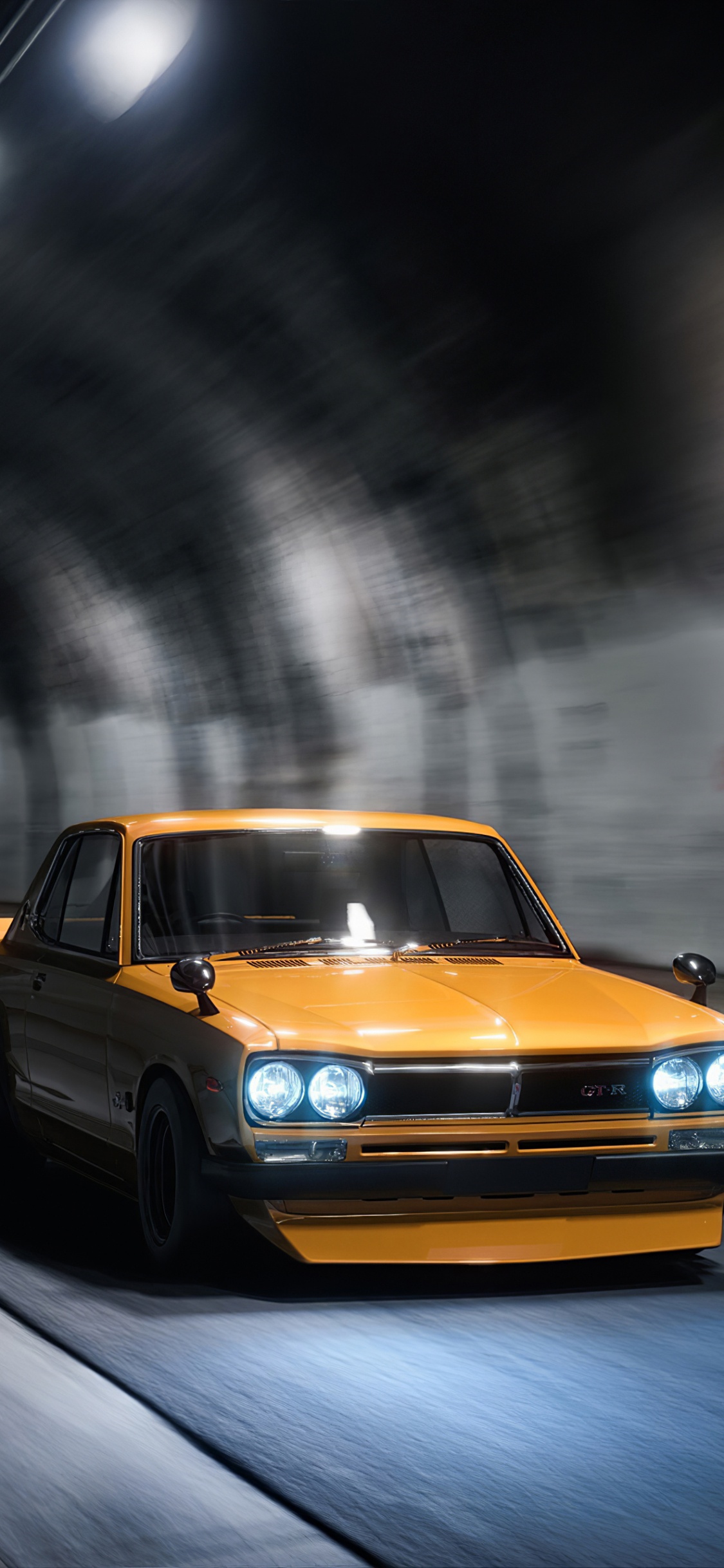 Yellow Chevrolet Camaro on Road. Wallpaper in 1125x2436 Resolution