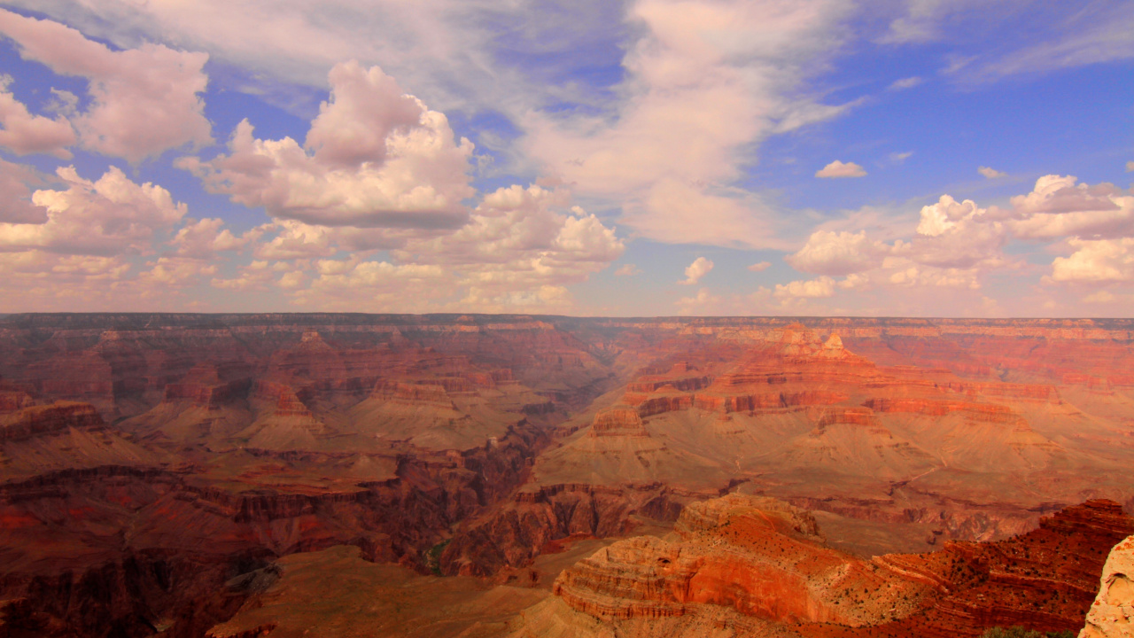 Brown and Gray Mountains Under White Clouds and Blue Sky During Daytime. Wallpaper in 1280x720 Resolution