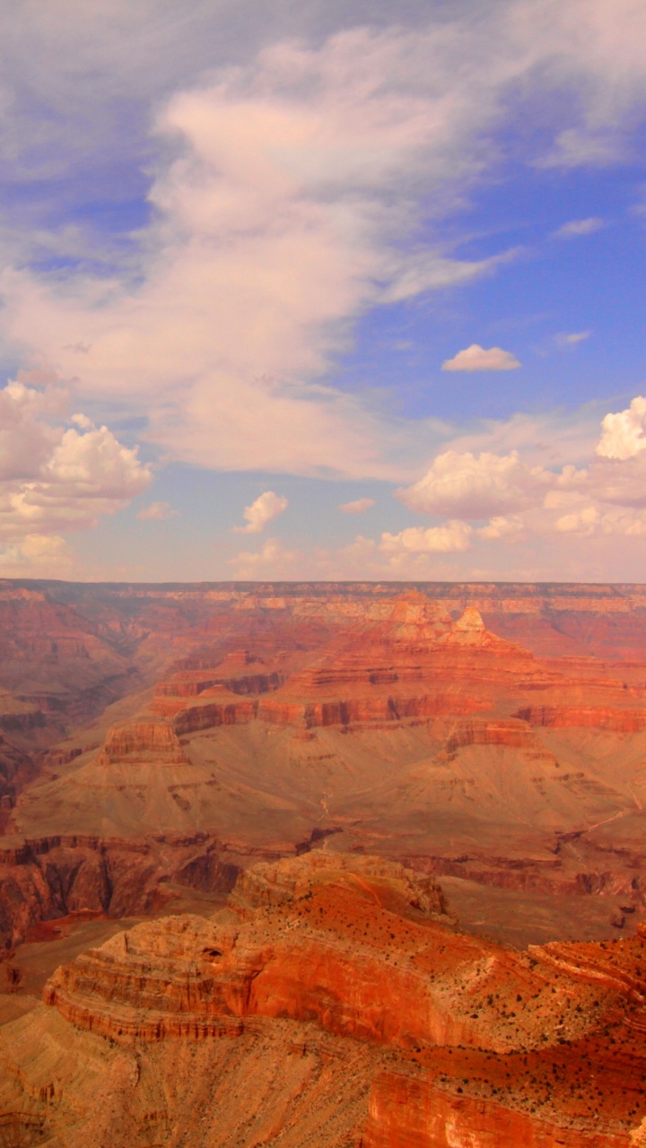 Brown and Gray Mountains Under White Clouds and Blue Sky During Daytime. Wallpaper in 720x1280 Resolution