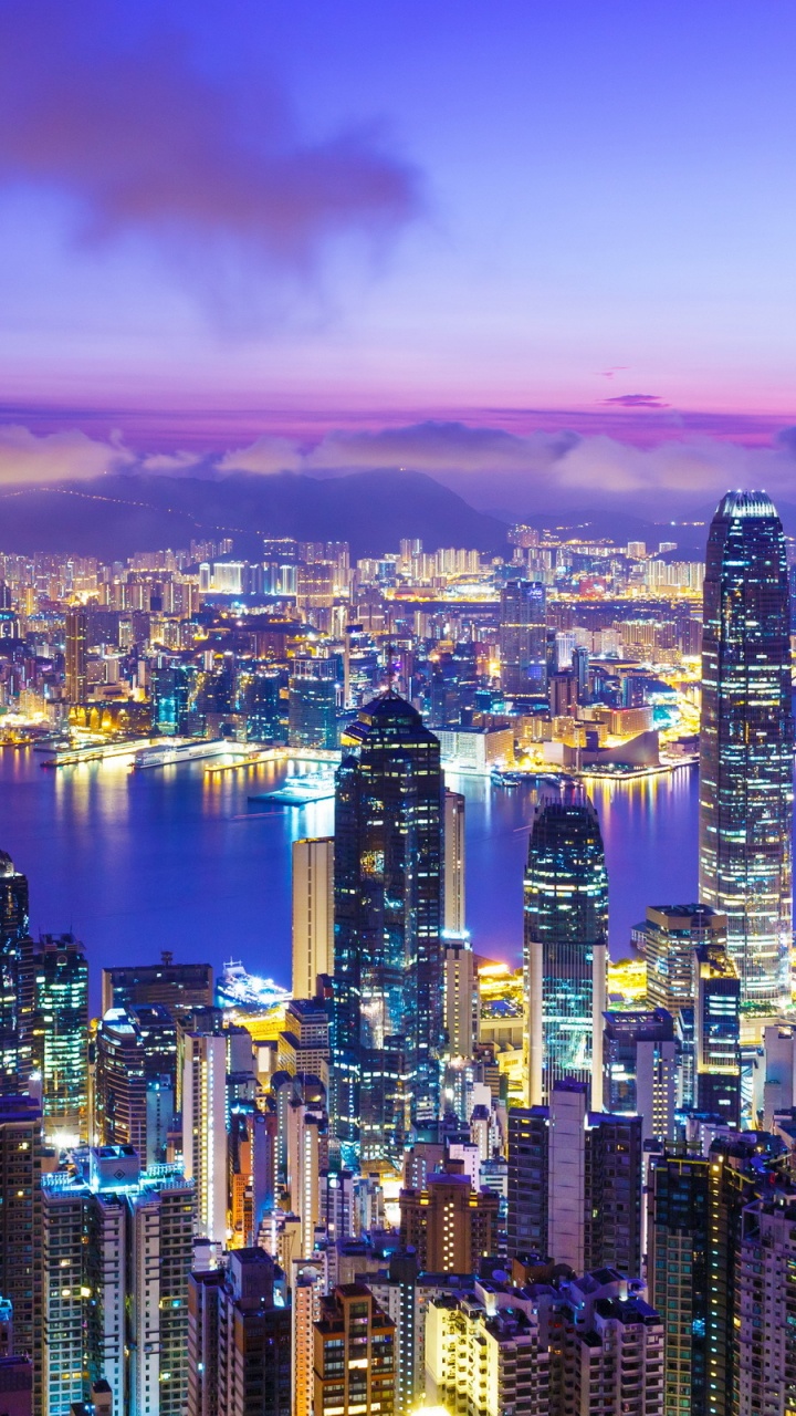 Horizonte de la Ciudad Durante la Noche. Wallpaper in 720x1280 Resolution