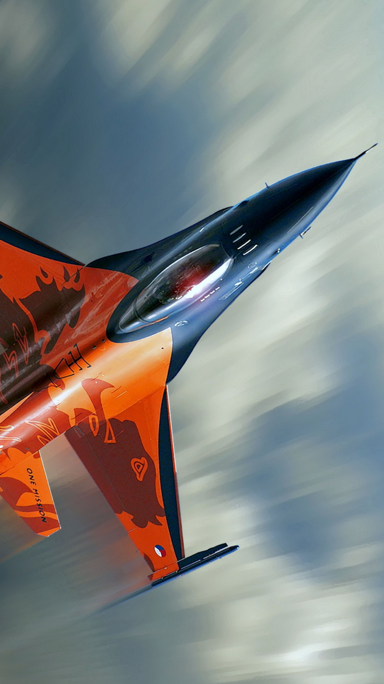 Orange and Gray Jet Plane in Mid Air. Wallpaper in 750x1334 Resolution