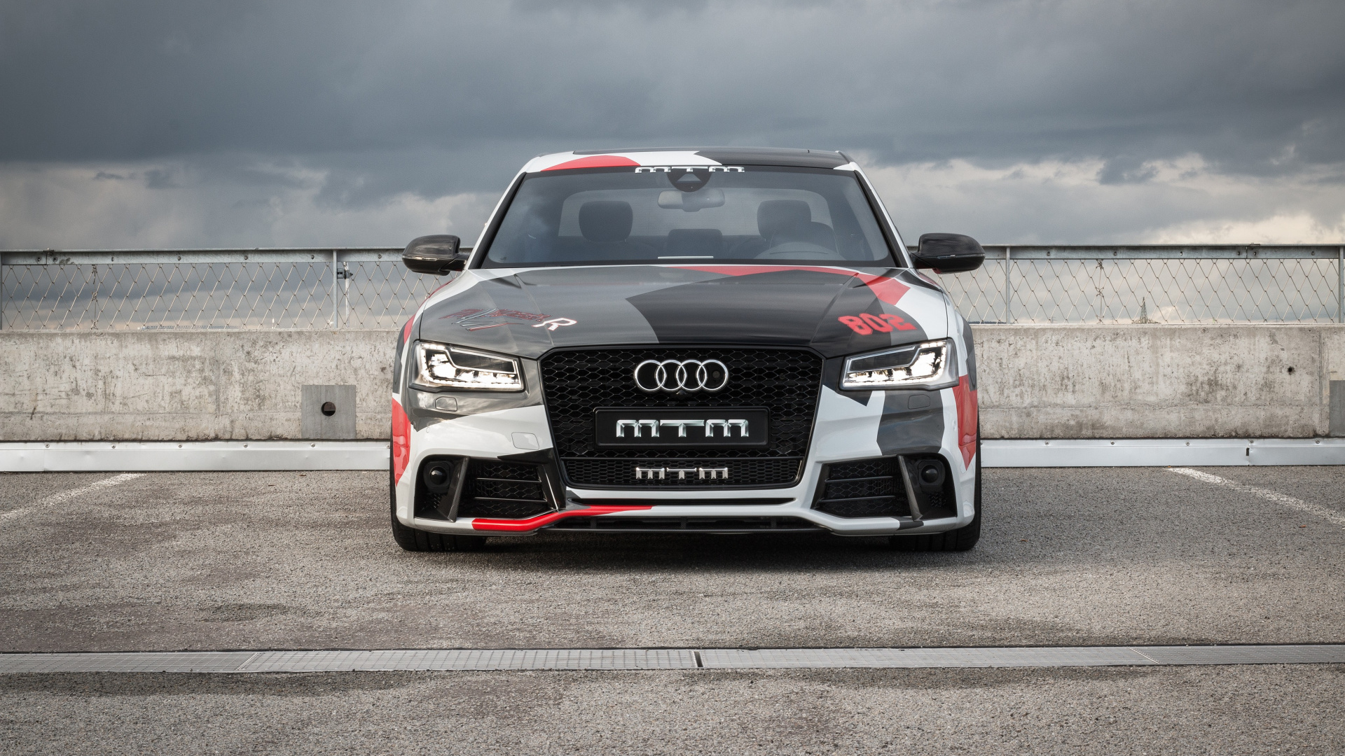 Black Audi a 4 on a Gray Asphalt Road. Wallpaper in 1920x1080 Resolution