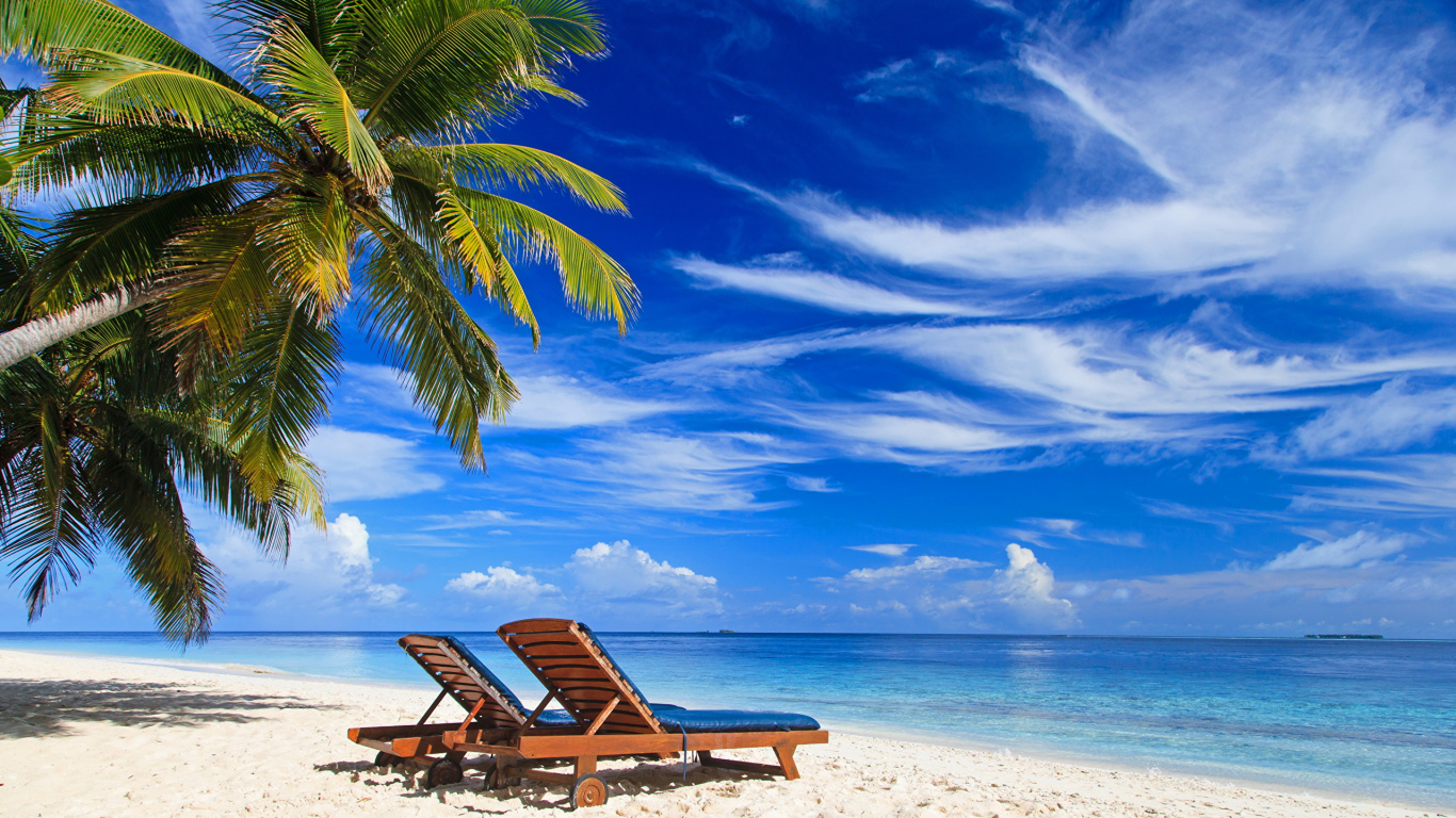 Brown Wooden Lounge Chair on Beach During Daytime. Wallpaper in 1366x768 Resolution