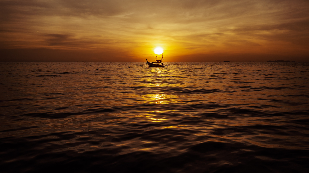 Silhouette of Person on Sea During Sunset. Wallpaper in 1280x720 Resolution