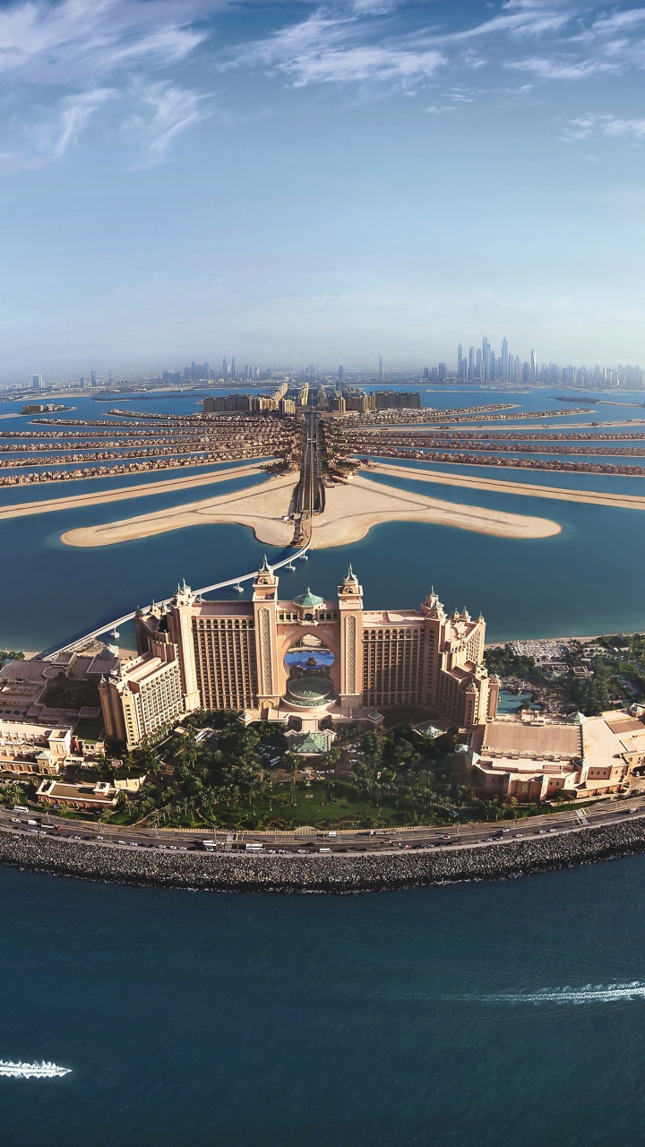 Aerial View of City Buildings Near Body of Water During Daytime. Wallpaper in 720x1280 Resolution
