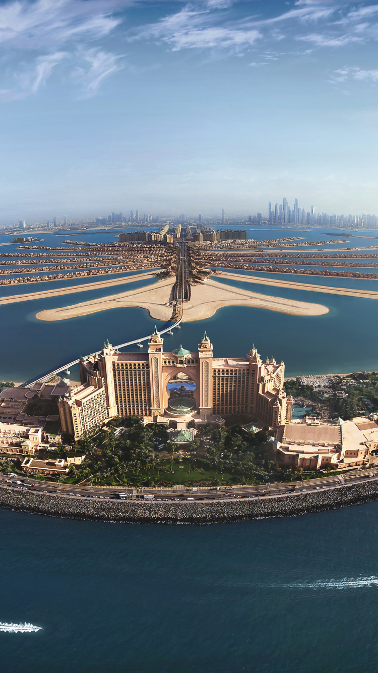 Vue Aérienne Des Bâtiments de la Ville Près du Plan D'eau Pendant la Journée. Wallpaper in 750x1334 Resolution