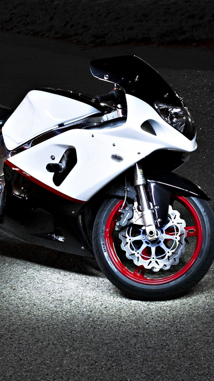 Black and White Sports Bike on Black Asphalt Road. Wallpaper in 750x1334 Resolution