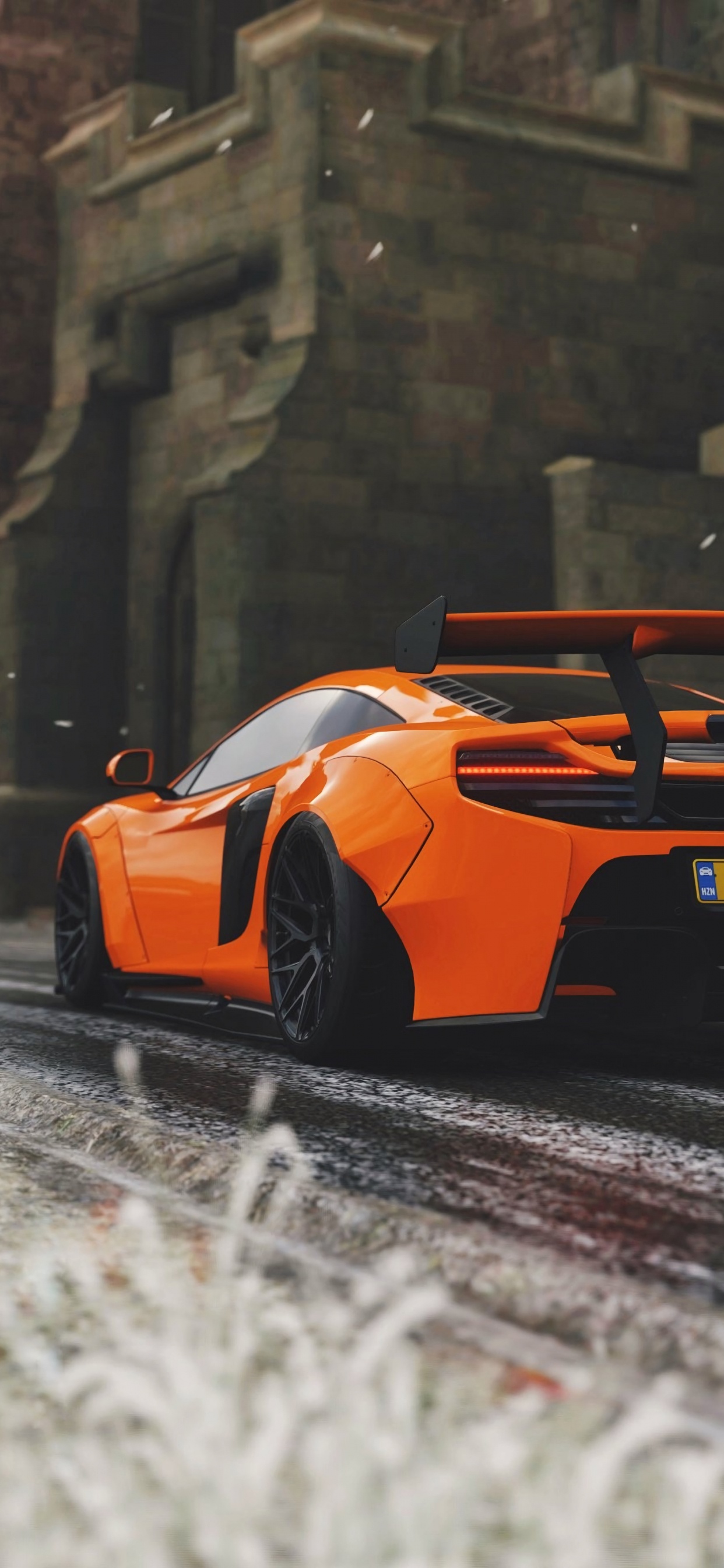 Oranger Lamborghini Aventador Unterwegs On. Wallpaper in 1242x2688 Resolution