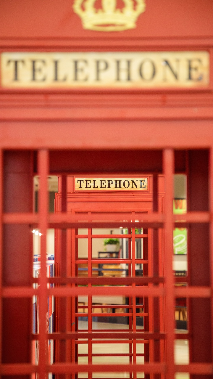 Red Wooden Telephone Booth With Red Wooden Frame. Wallpaper in 720x1280 Resolution