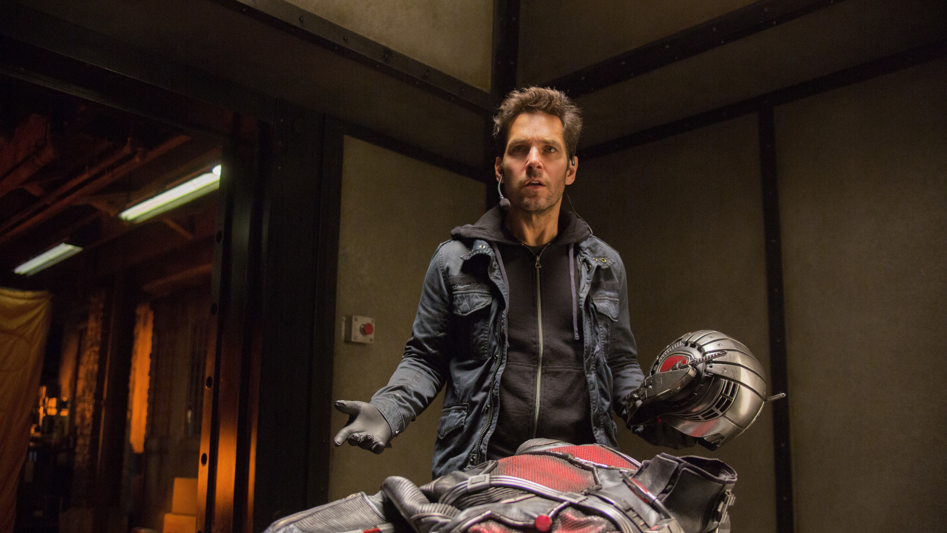 Man in Black Leather Jacket Sitting on Chair. Wallpaper in 1920x1080 Resolution