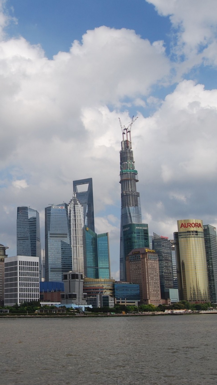 City Skyline Under Cloudy Sky During Daytime. Wallpaper in 720x1280 Resolution