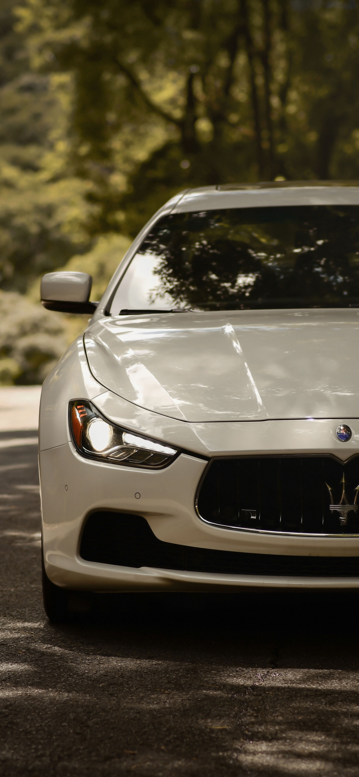 White Bmw m 3 on Road During Daytime. Wallpaper in 1242x2688 Resolution