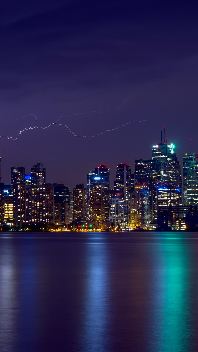 City Skyline During Night Time. Wallpaper in 750x1334 Resolution