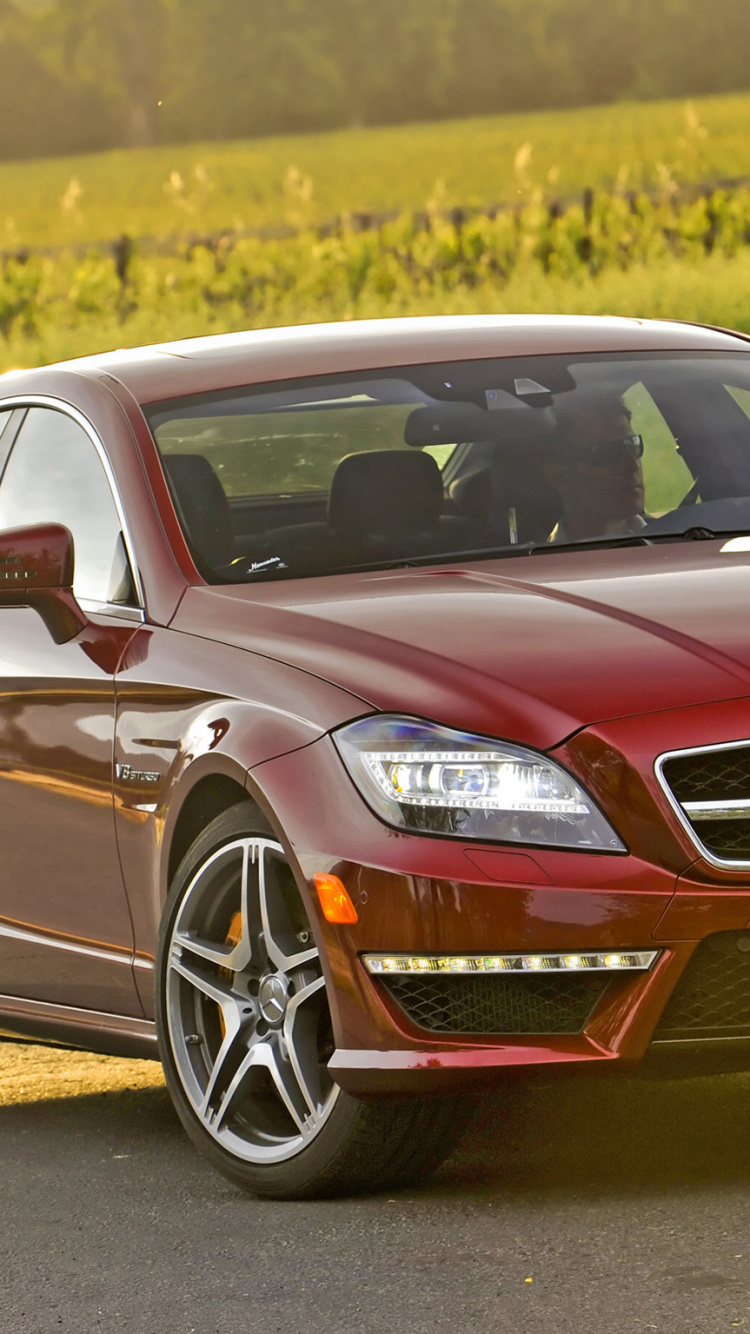 Red Mercedes Benz Coupe on Road During Daytime. Wallpaper in 750x1334 Resolution