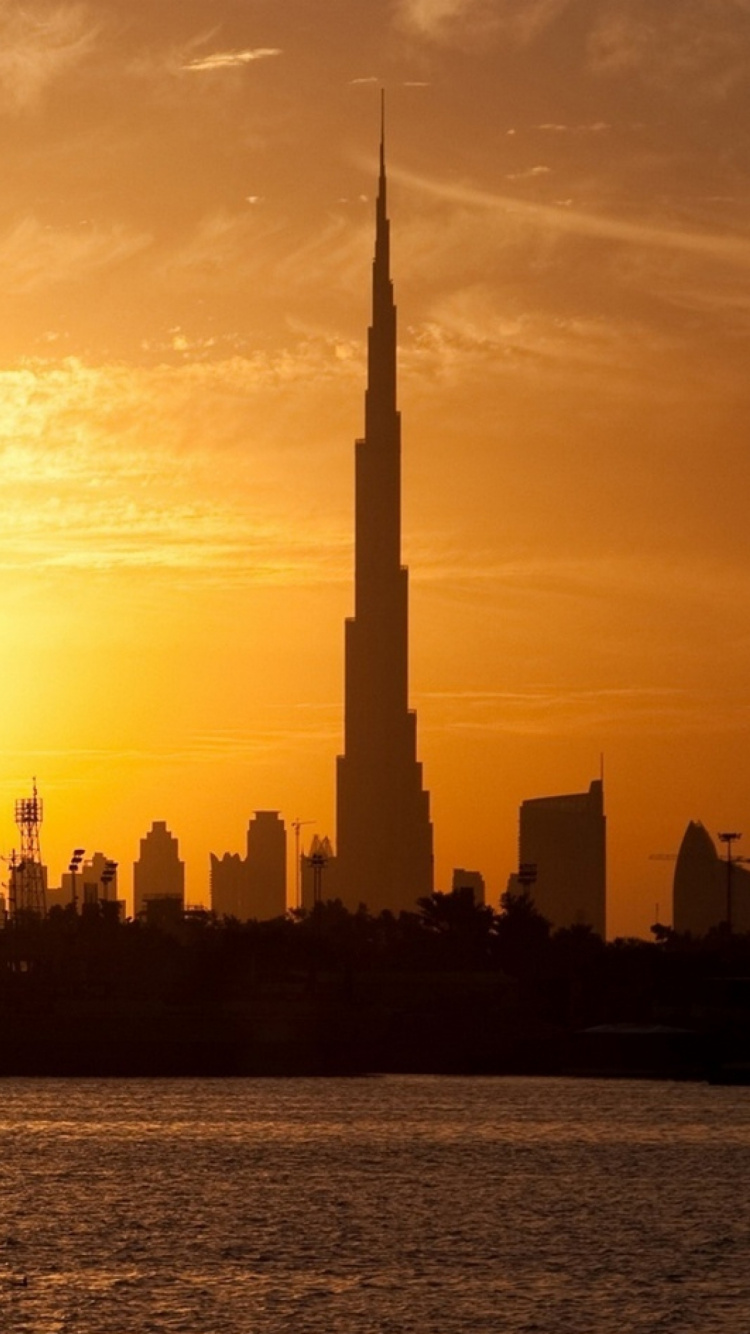 Silhouette of City Buildings During Sunset. Wallpaper in 750x1334 Resolution