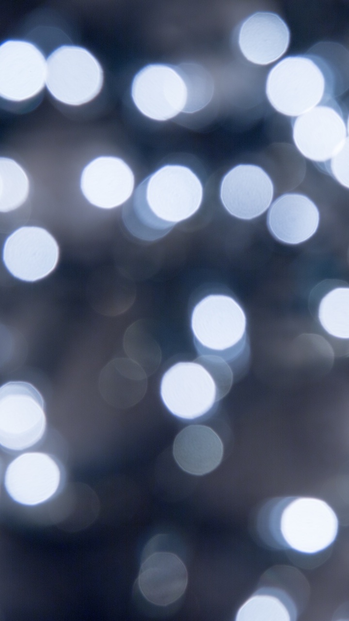 White and Blue Bokeh Lights. Wallpaper in 720x1280 Resolution