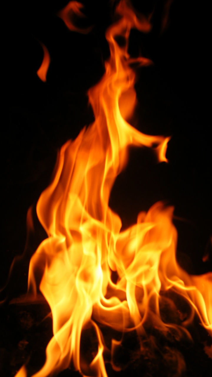 Fire in Black Background With Black Background. Wallpaper in 720x1280 Resolution