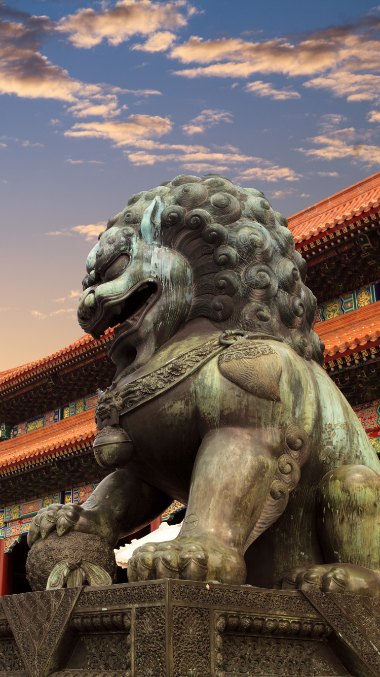 Gray Concrete Statue of Man With Wings Under Blue Sky During Daytime. Wallpaper in 750x1334 Resolution