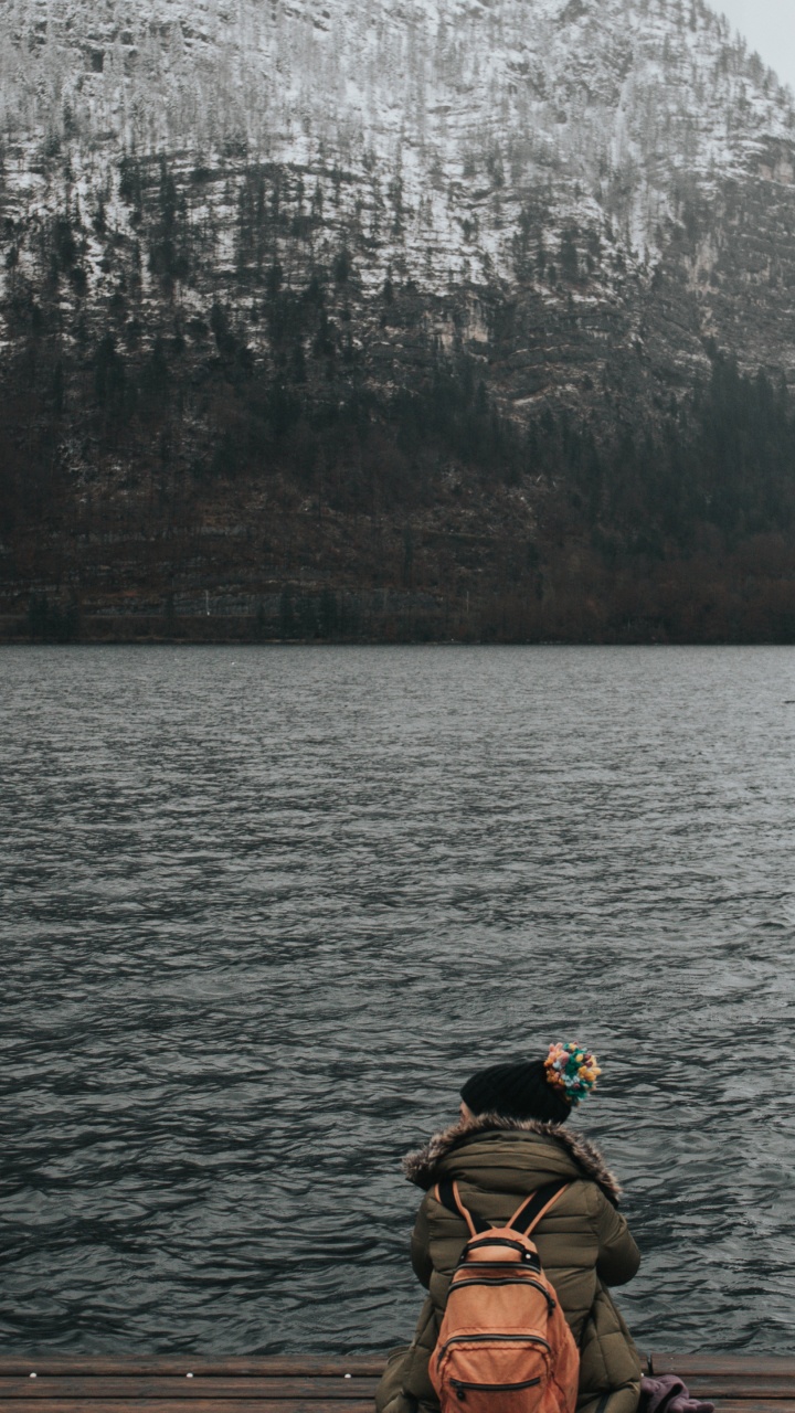 Man in Black and Yellow Goggles Riding Boat on Lake During Daytime. Wallpaper in 720x1280 Resolution